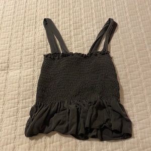 An XS black tank top from Urban Outfitters.